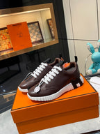 H Striped Leather Sneakers