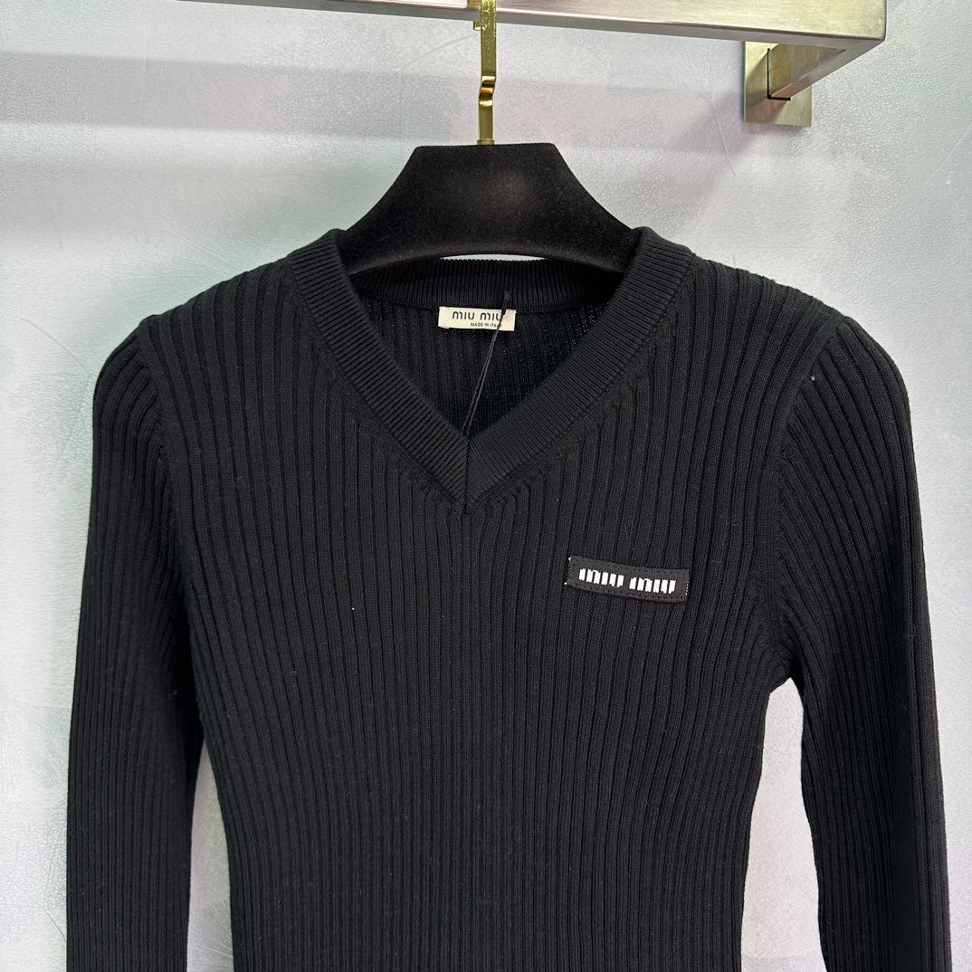 Ribbed High-Neck Wool Sweater